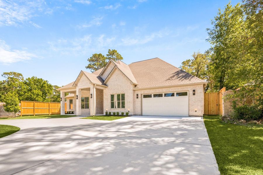 Front exterior of a new home in , Houston, TX, highlighting curb appeal (Image 26).