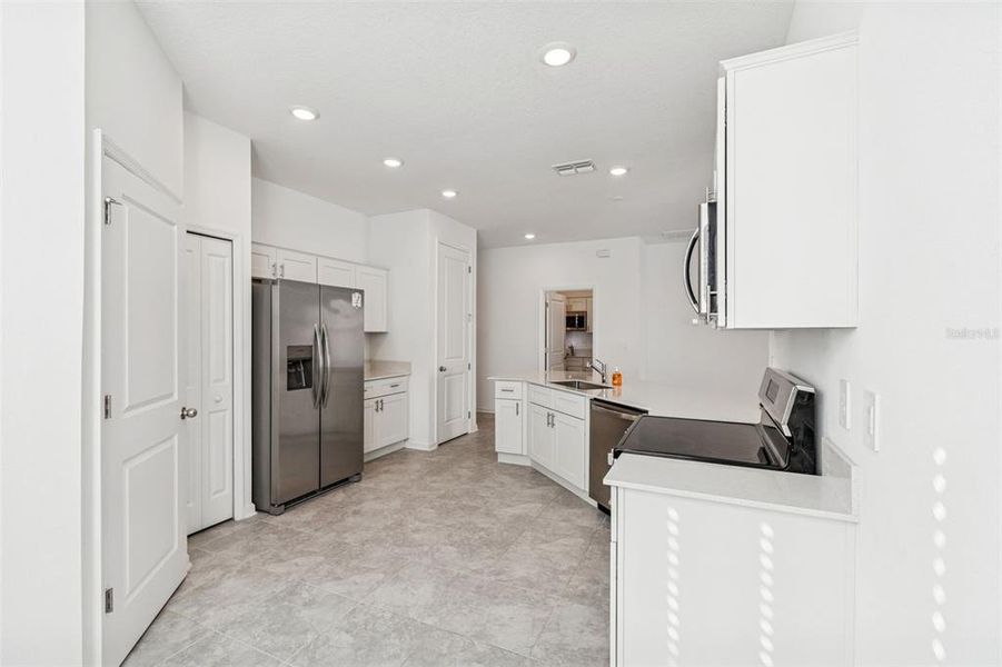 Furnished interior view inside a new home in Ranches at Lake McLeod, Eagle Lake (Image 10).