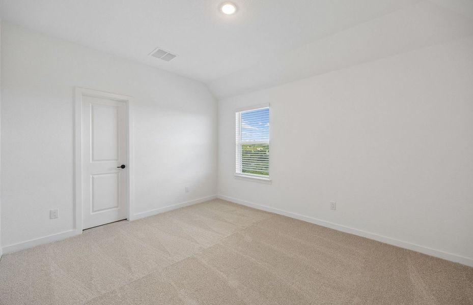 Representative unfurnished interior of a home built from the Wheeler by Pulte Homes in West Cypress Hills, Spicewood (Image 16).