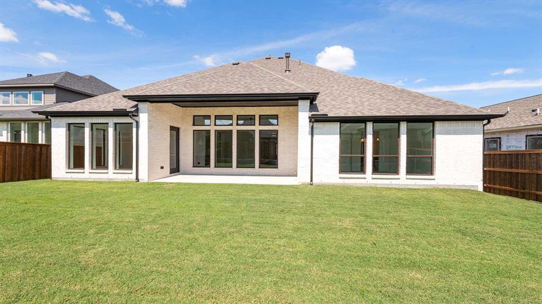 Exterior details and patio area of a home in Trinity Falls 60', McKinney (Image 1). Exterior details and patio area of a home in Trinity Falls 60', McKinney (Image 1).