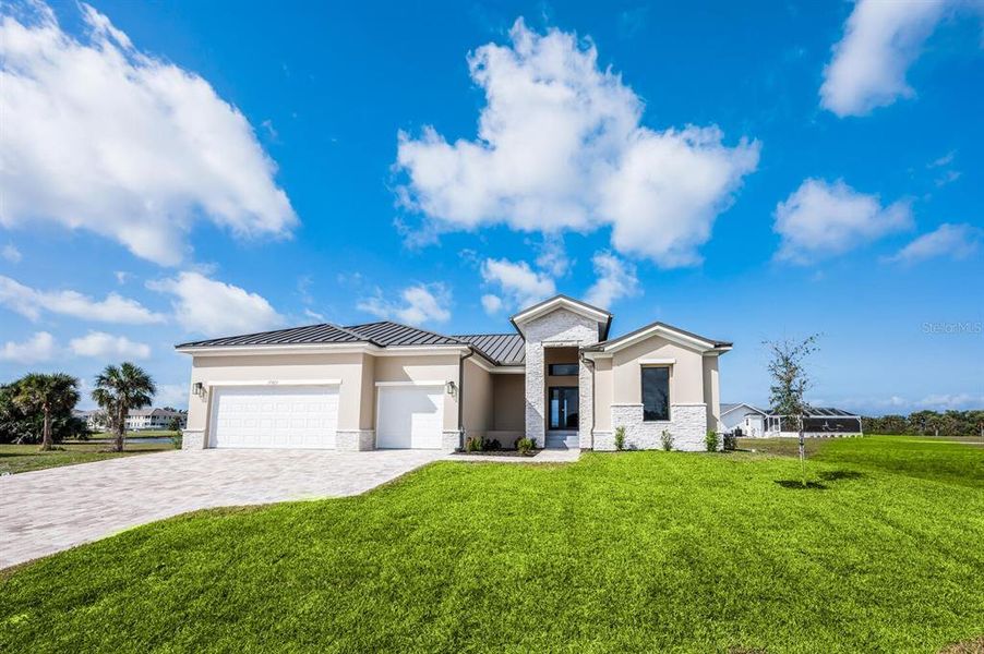 Front exterior of a new home in , Punta Gorda, FL, highlighting curb appeal (Image 16). Front exterior of a new home in , Punta Gorda, FL, highlighting curb appeal (Image 16).