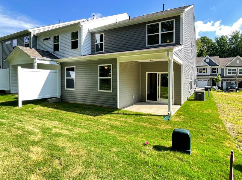 Front exterior of a new home in Fairview Village Townhomes, Simpsonville, SC, highlighting curb appeal (Image 16). Front exterior of a new home in Fairview Village Townhomes, Simpsonville, SC, highlighting curb appeal (Image 16).