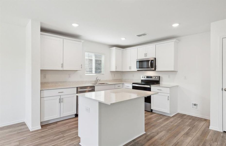 Spacious kitchen with ample cabinet space*real home pictured