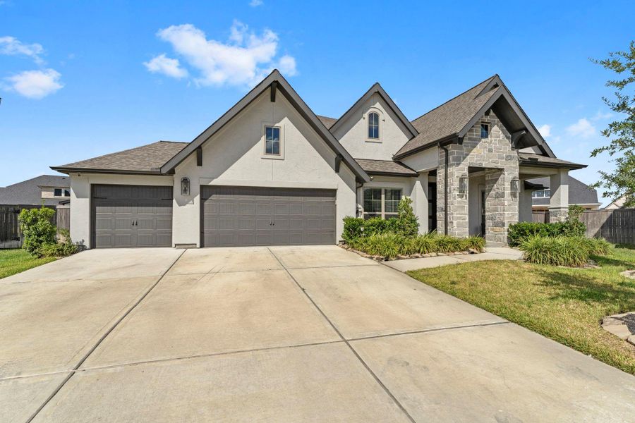 Welcome home to 20914 Steeplechase Knoll Cir in Tomball! This pretty Perry Home has an elegant stucco and stone elevation. Welcome home to 20914 Steeplechase Knoll Cir in Tomball! This pretty Perry Home has an elegant stucco and stone elevation.