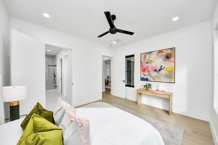 Contemporary first-floor retreat with a private bathroom.