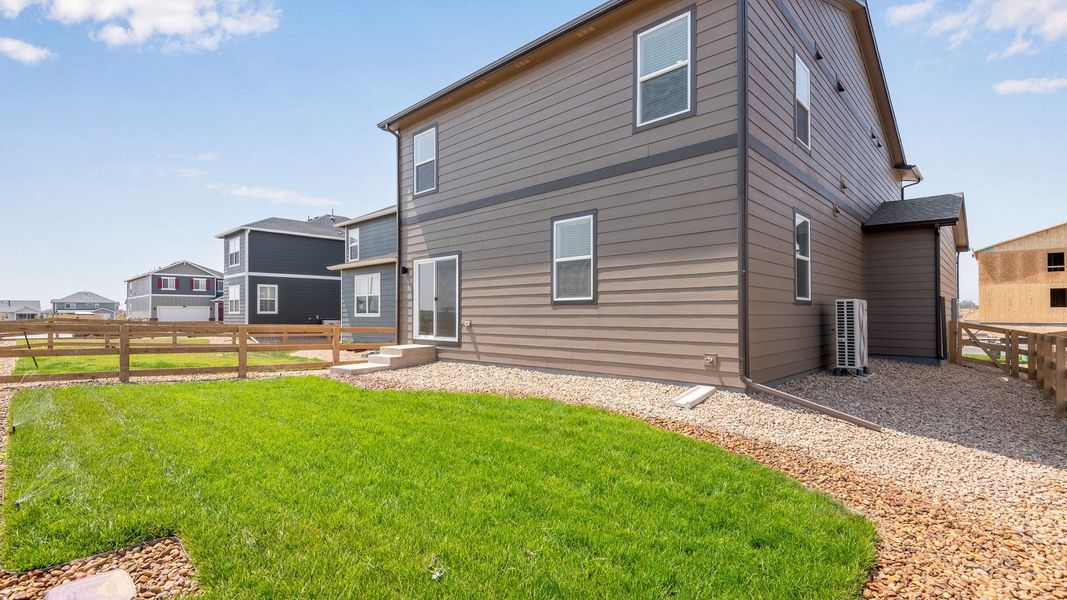 Exterior details and patio area of a home in Prairie Song, Windsor (Image 2). Exterior details and patio area of a home in Prairie Song, Windsor (Image 2).