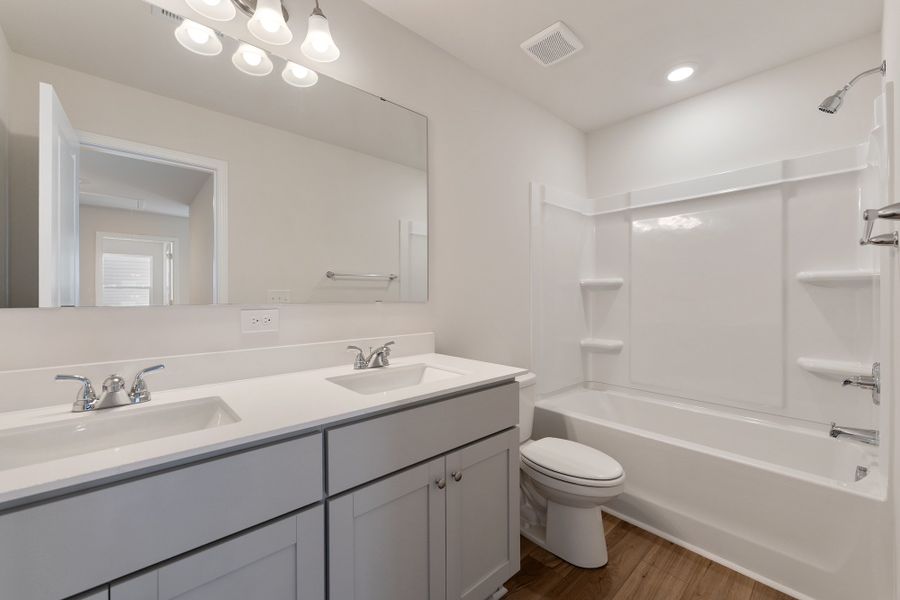Furnished interior view inside a new home in Richmond Hill, Inman (Image 13).