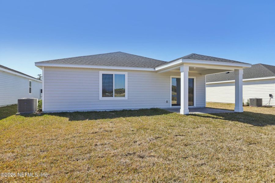 Exterior details and patio area of a home in Colbert Landings, Palm Coast (Image 21).