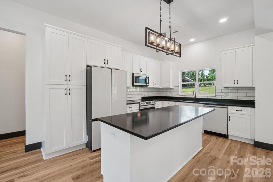 Furnished interior view inside a new home in , Hendersonville (Image 7).