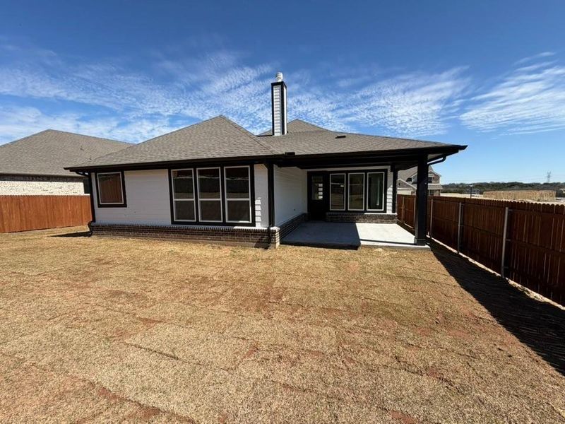Exterior details and patio area of a home in Waterford Park, Weatherford (Image 3).