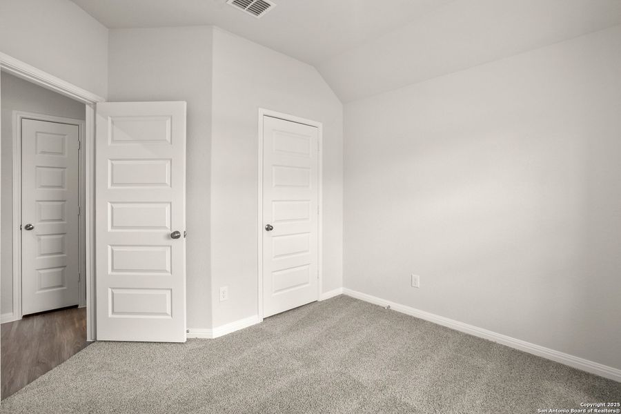 Spacious, unfurnished interior of a new home in Hunters Ranch, San Antonio (Image 12).