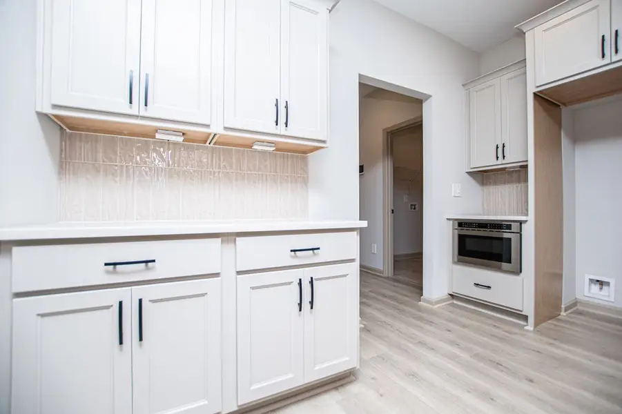 Furnished interior view inside a new home in WOODMONT RESERVE, Roopville (Image 8).