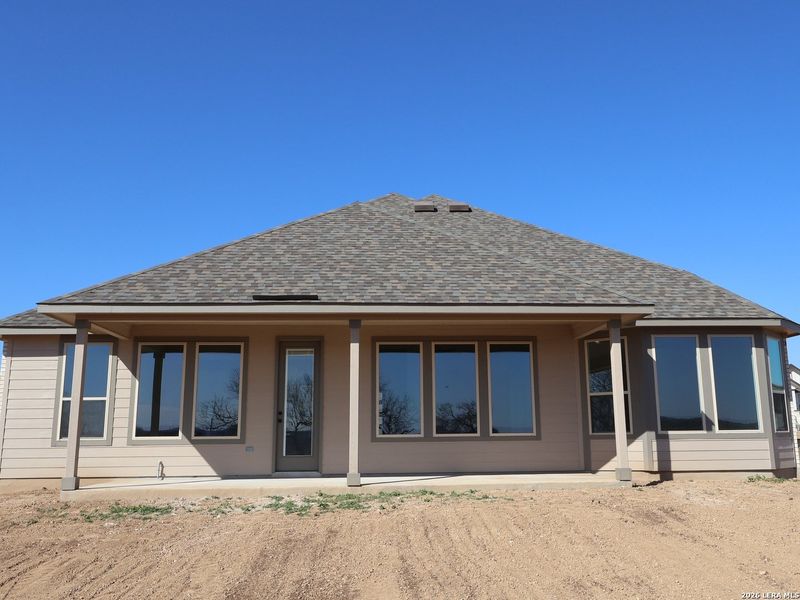 Exterior details and patio area of a home in Preserve at Annabelle Ranch, San Antonio (Image 4).