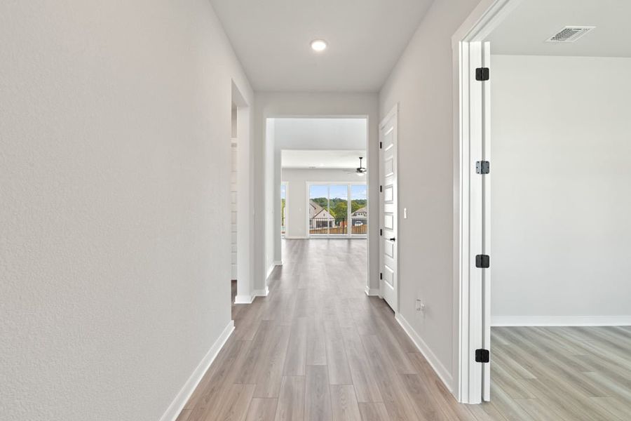 Spacious, unfurnished interior of a new home in Capitol Collection at Lariat, Liberty Hill (Image 16).