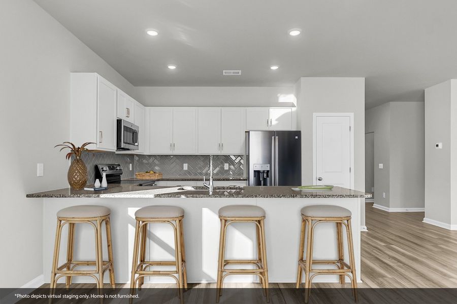 Furnished interior view inside a new home in Fairway Woods at Wyboo, Manning (Image 29).