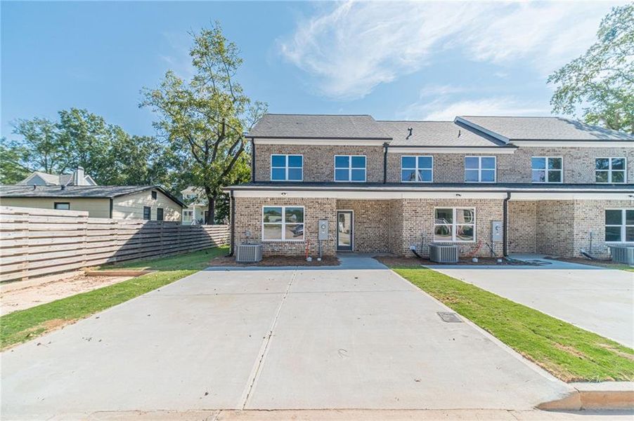 Front exterior of a new home in , Monroe, GA, highlighting curb appeal (Image 2). Front exterior of a new home in , Monroe, GA, highlighting curb appeal (Image 2).