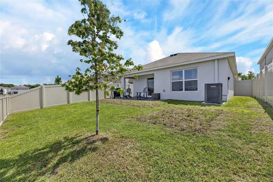 Exterior details and patio area of a home in Berry Bay, Wimauma (Image 3).