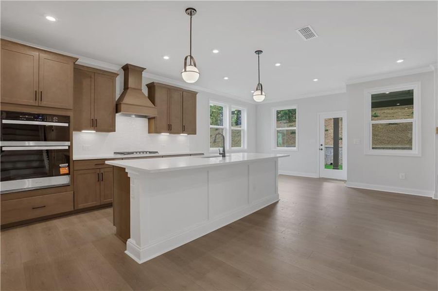 Furnished interior view inside a new home in The Paddocks at Doc Hughes, Buford (Image 7).
