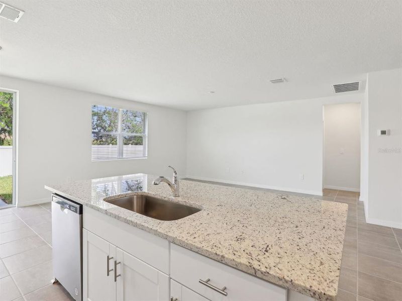 Furnished interior view inside a new home in The Reserve at Van Oaks, Auburndale (Image 9).