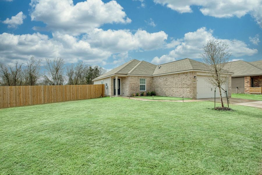 Large side front yard.