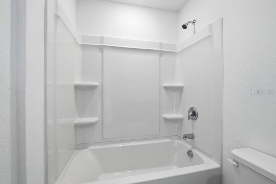 Furnished interior view inside a new home in The Towns at Firethorn, Parrish (Image 9).