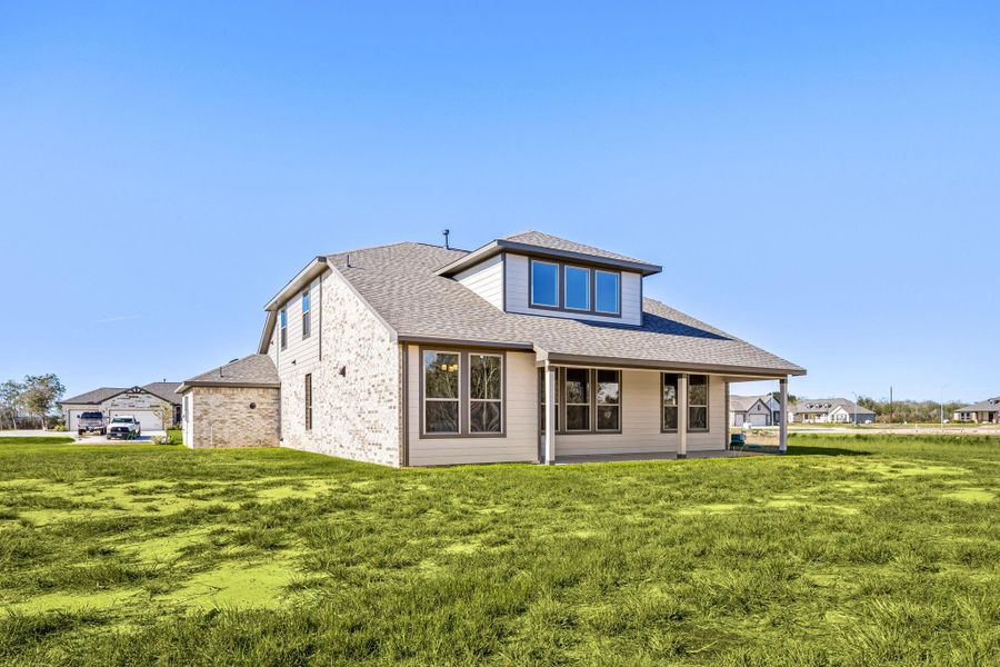 Exterior details and patio area of a home in Southfork Ranch, Sealy (Image 4).