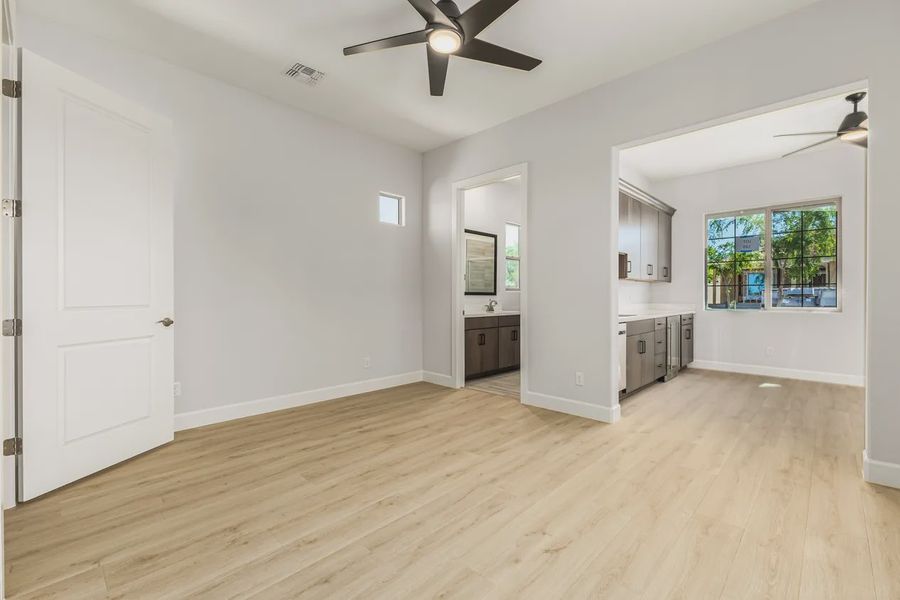 Spacious, unfurnished interior of a new home in Bellero Estates, Queen Creek (Image 22).