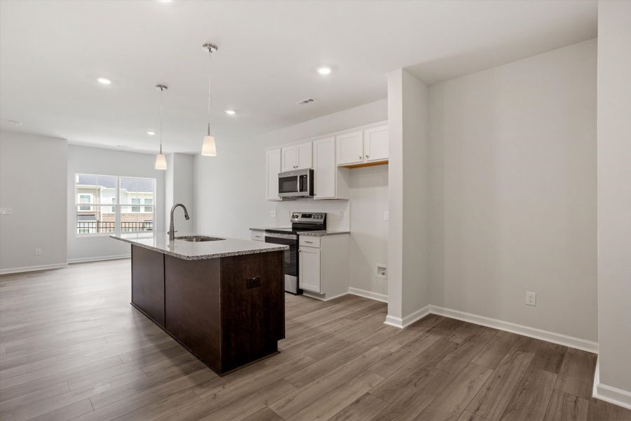 Furnished interior view inside a new home in Renaissance at White Oak, Garner (Image 11).