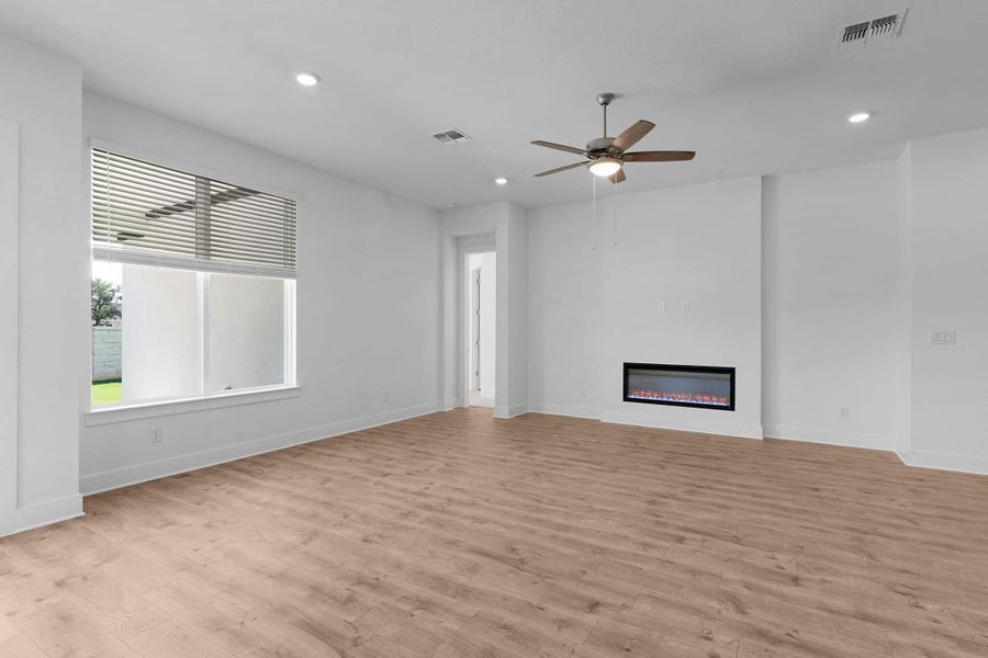 Representative unfurnished interior of a home built from the Lucas by Chesmar Homes in Parkside on the River, Georgetown (Image 7).