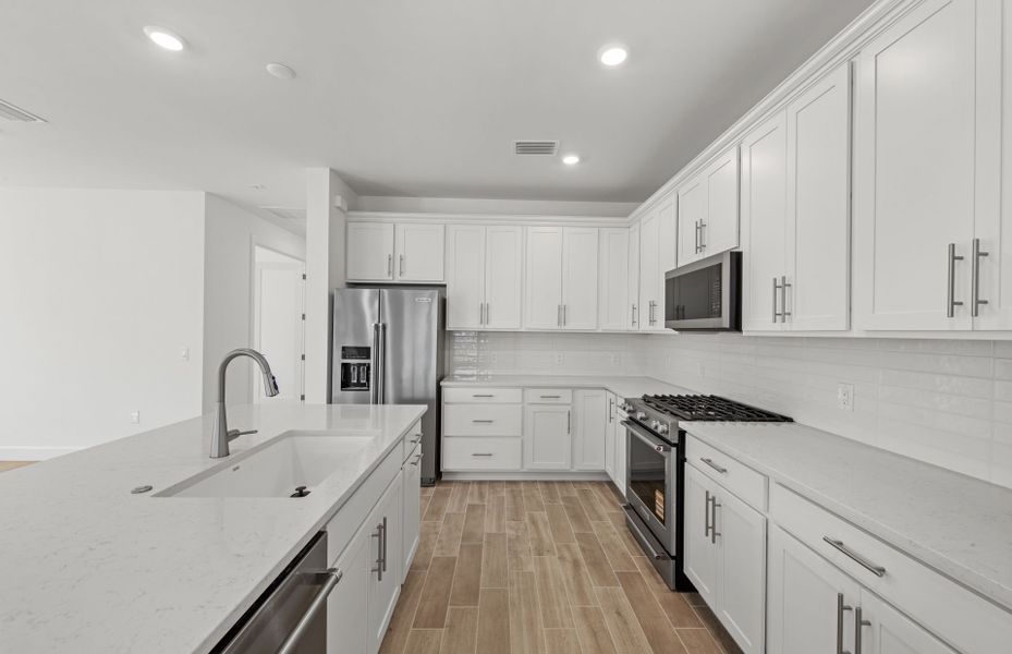 Furnished interior view inside a new home in TerraWalk at Babcock Ranch, Alva (Image 12).