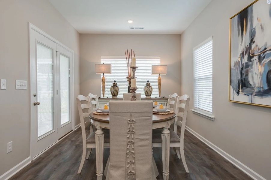 Stock Photo: Separate Dining area w/ hinged door leading out to covered back porch Stock Photo: Separate Dining area w/ hinged door leading out to covered back porch