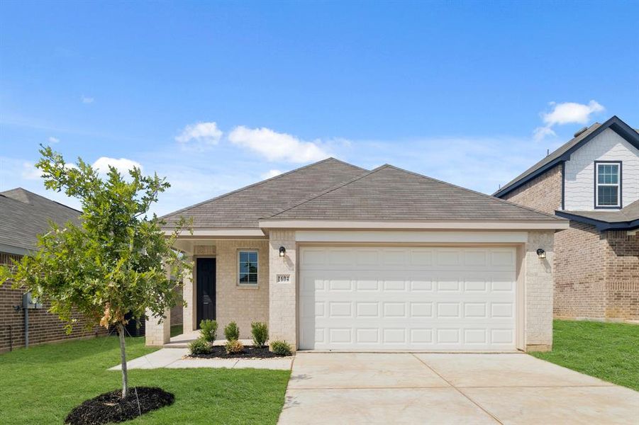 Front exterior of a new home in Christian Meadows, Ennis, TX, highlighting curb appeal (Image 1). Front exterior of a new home in Christian Meadows, Ennis, TX, highlighting curb appeal (Image 1).
