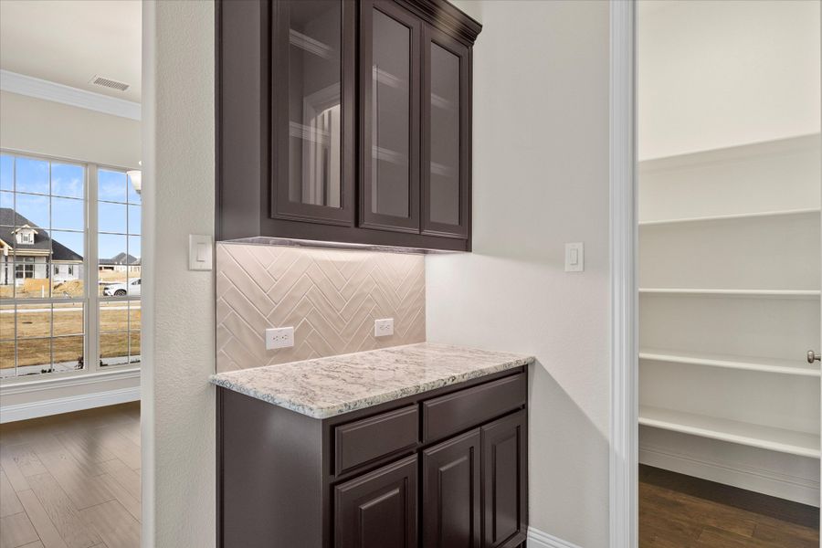 Representative furnished interior of a home built from the Riverdale by Windsor Homes in Ridge Pointe Estates, McLendon-Chisholm (Image 11).