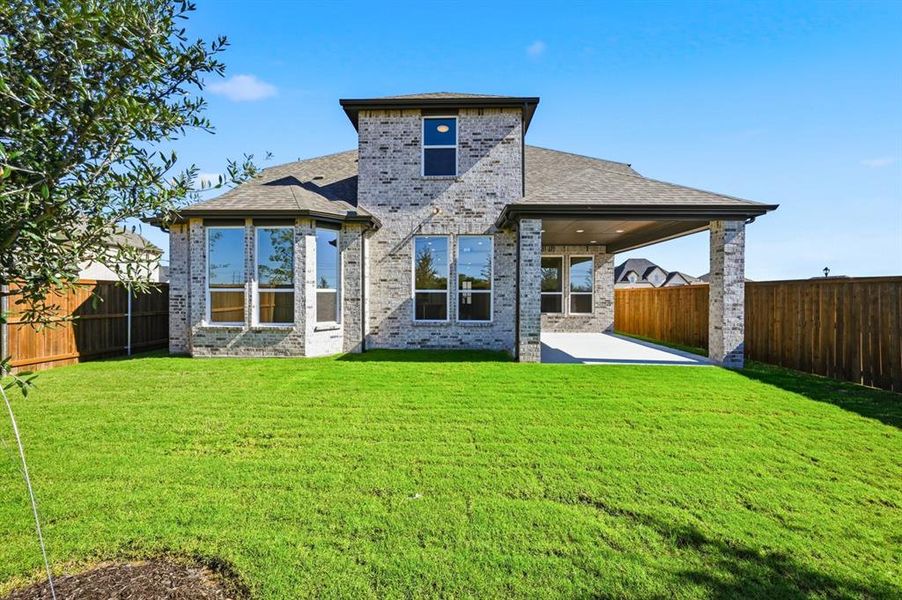 Exterior details and patio area of a home in Wellington: Artisan Series - 50ft lots, Haslet (Image 3). Exterior details and patio area of a home in Wellington: Artisan Series - 50ft lots, Haslet (Image 3).