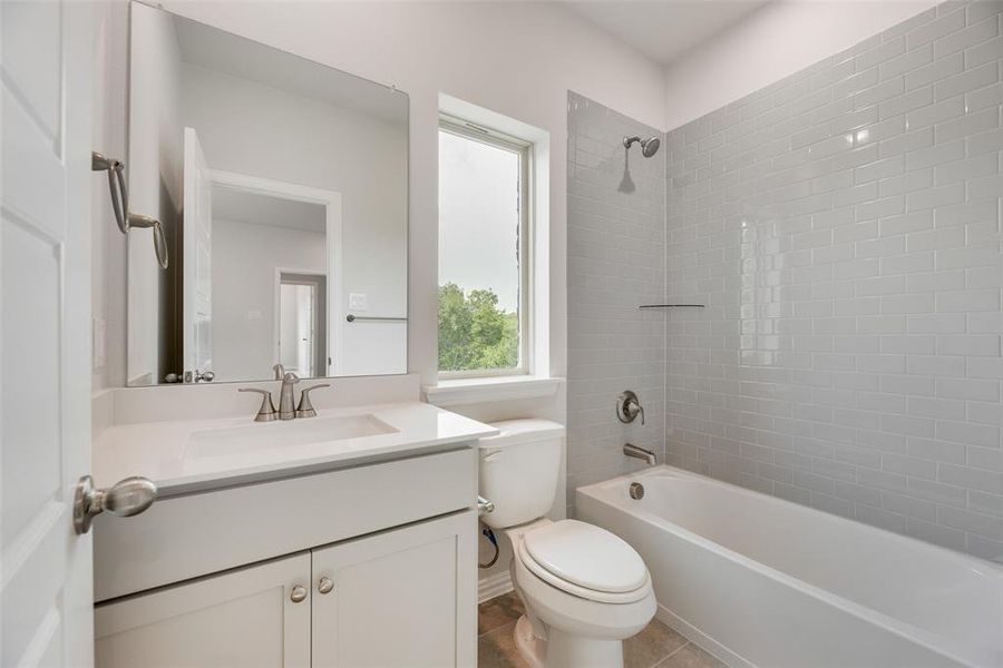 Furnished interior view inside a new home in Valencia On The Lake, Little Elm (Image 15). Furnished interior view inside a new home in Valencia On The Lake, Little Elm (Image 15).