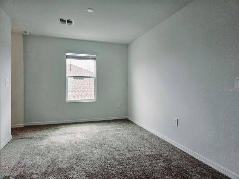 Spacious, unfurnished interior of a new home in Peace Creek Reserve, Winter Haven (Image 15).
