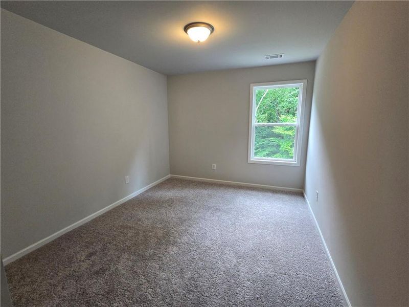 Spacious, unfurnished interior of a new home in Enclave at Logan Point, Loganville (Image 27).