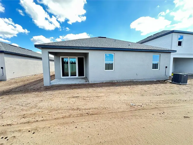Exterior details and patio area of a home in Berry Bay, Wimauma (Image 2). Exterior details and patio area of a home in Berry Bay, Wimauma (Image 2).