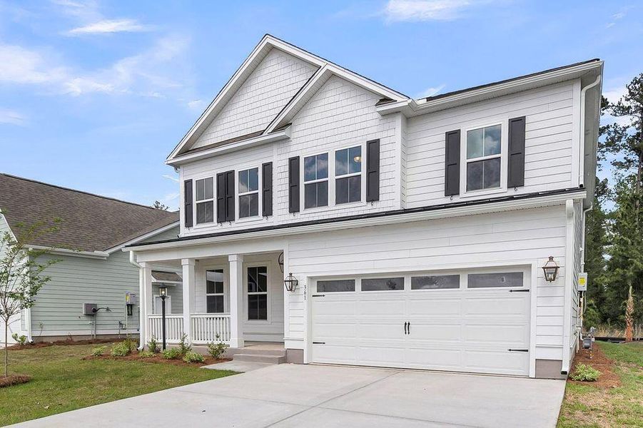 Front exterior of a new home in Kings River Preserve, Hollywood, SC, highlighting curb appeal (Image 2). Front exterior of a new home in Kings River Preserve, Hollywood, SC, highlighting curb appeal (Image 2).