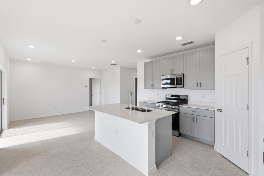 Furnished interior view inside a new home in Highfield at Twisted Oaks, Wildwood (Image 6).