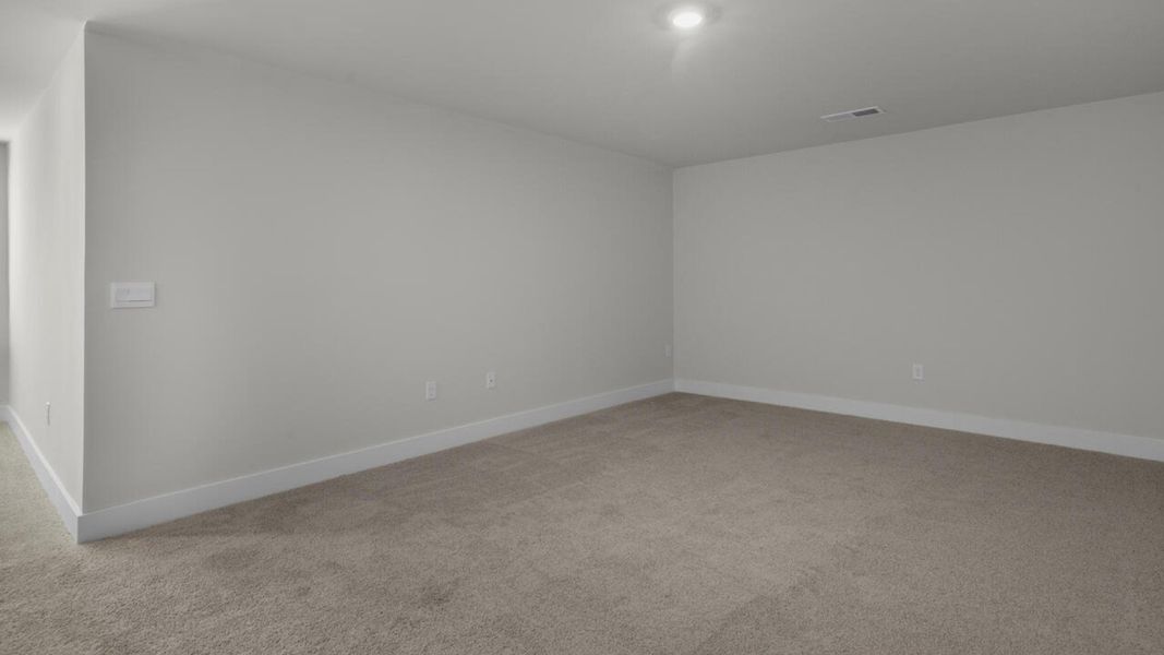 Spacious, unfurnished interior of a new home in Surfside Landing, Hubert (Image 23).