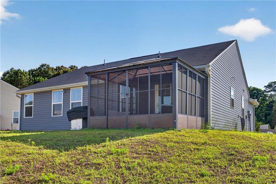 Exterior details and patio area of a home in Riverside at Calhoun, Calhoun (Image 23).
