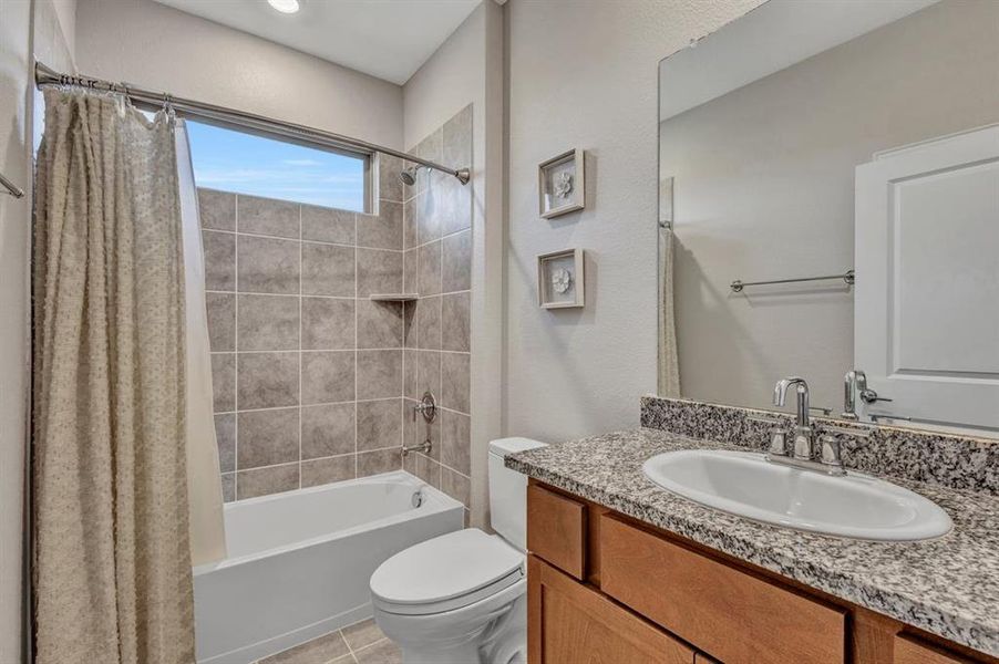 Bathroom #1 conveniently located near the front bedroom.