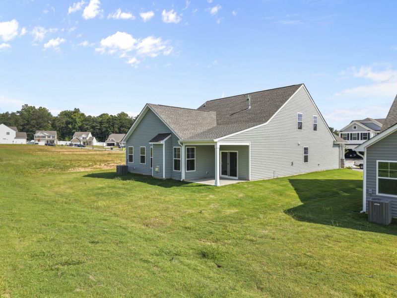 Front exterior of a new home in Hopewell Garden, Winston-Salem, NC, highlighting curb appeal (Image 22). Front exterior of a new home in Hopewell Garden, Winston-Salem, NC, highlighting curb appeal (Image 22).