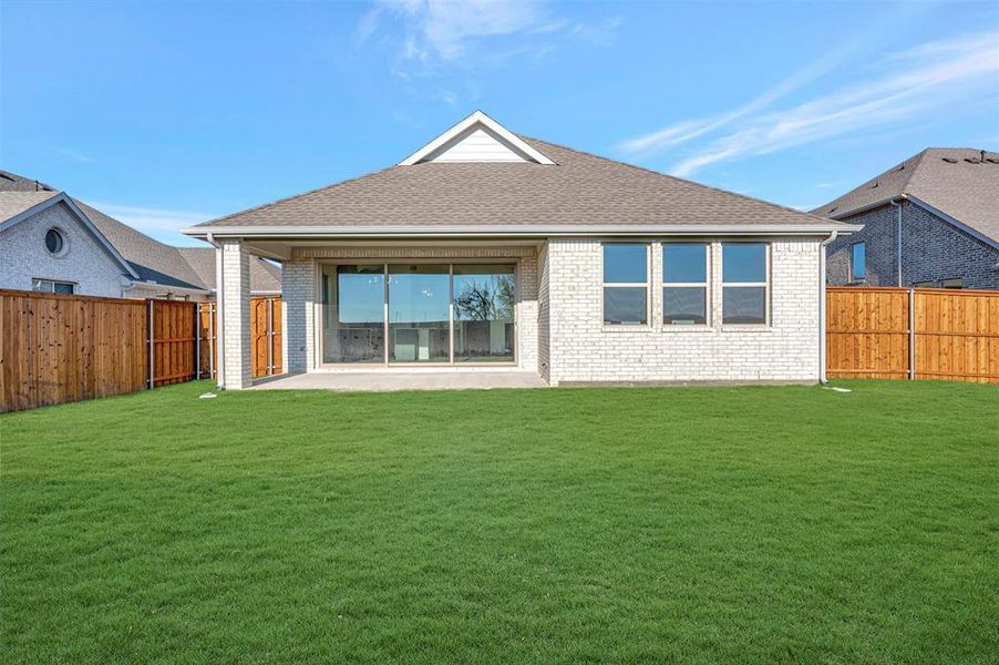 Exterior details and patio area of a home in Gateway Parks, Forney (Image 24).
