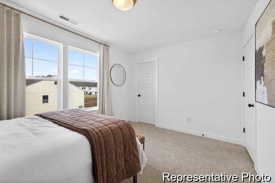 Furnished interior view inside a new home in North District at Flowers Plantation Townhomes, Clayton (Image 24). Furnished interior view inside a new home in North District at Flowers Plantation Townhomes, Clayton (Image 24).