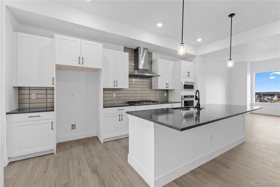 Furnished interior view inside a new home in Dillon Pointe - Skyview, Broomfield (Image 8).