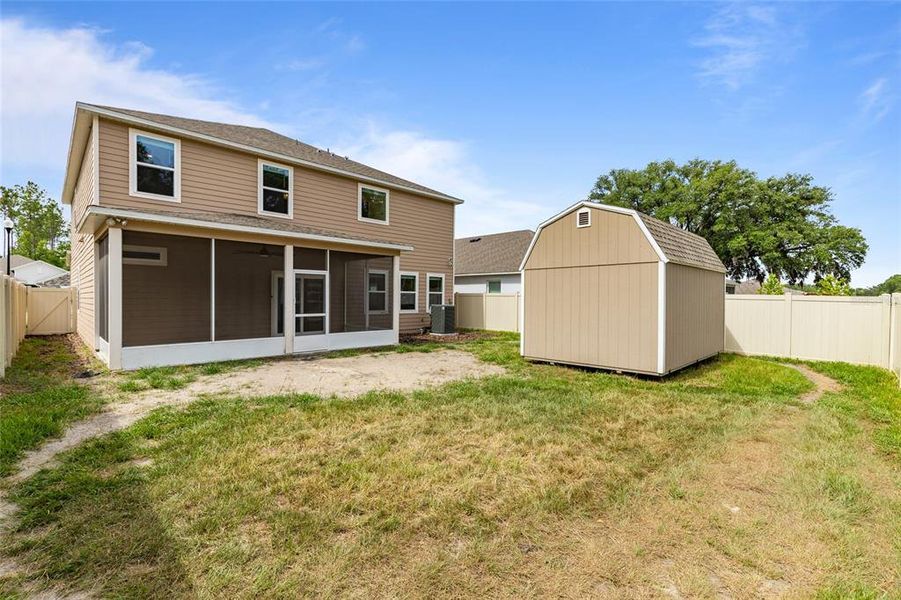 Exterior details and patio area of a home in Avalon Woods, Newberry (Image 4).