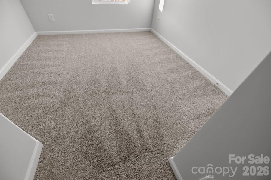 Spacious, unfurnished interior of a new home in Townes at Ribbon Walk, Charlotte (Image 12).