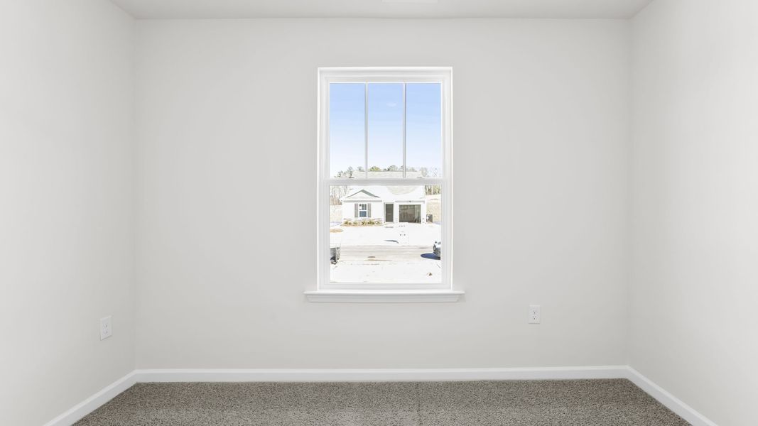 Spacious, unfurnished interior of a new home in Village Grove, Greenville (Image 17).